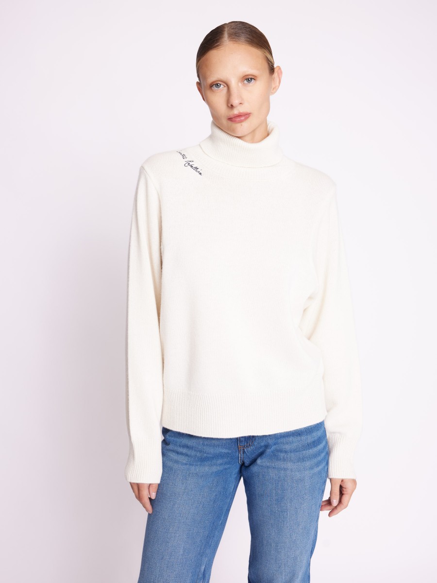 AXEA | White turtleneck jumper with embroidered wings