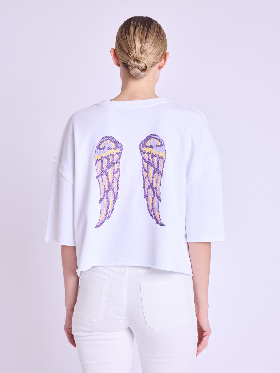 ECLIPSE | Camiseta blanca con alas en la espalda