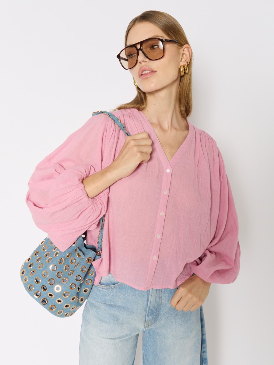 CREEK | Loose and flowing pink shirt